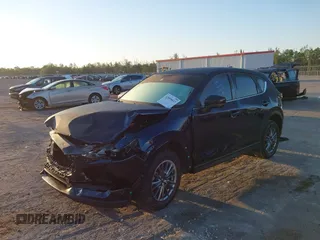 2021 Mazda CX-5 Touring with VIN JM3KFACM2M0450340, listed as a IAAI auction lot 42059613 with 38,960 mi miles and . Bid and sale history available at carsss.com. Image 2.