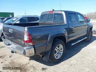 2013 Toyota Tacoma PreRunner with VIN 5TFJU4GN2DX031877, listed as a IAAI auction lot 41532757 with 176,797 mi miles. Bid and sale history available at carsss.com. Image 4.