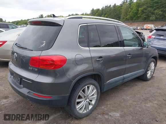 2012 Volkswagen Tiguan SE z VIN WVGAV7AX9CW000568, wystawiony jako IAAI lot #42322456 z przebiegiem 175 453 mil mil oraz . Historia ofert i sprzedaży dostępna na DreamBid. Obrazek 4.