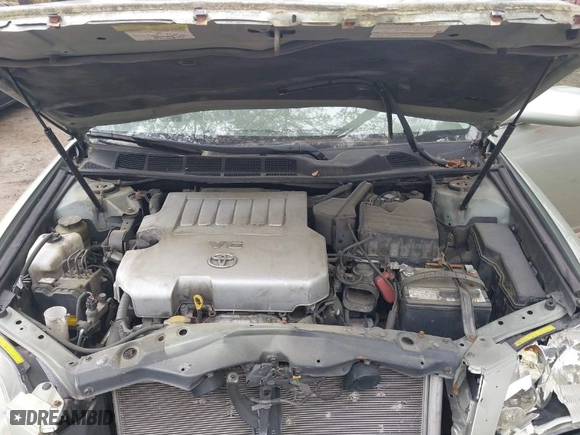 2005 Toyota Avalon XL with VIN 4T1BK36B55U033424, listed as a IAAI auction lot 41954652 with 231,640 mi miles. Bid and sale history available at carsss.com. Image 10.