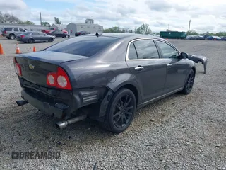 2012 Chevrolet Malibu LTZ with VIN 1G1ZG5E74CF297032, listed as a IAAI auction lot 42133482 with 82,682 mi miles and . Bid and sale history available at DreamBid. Image 4.