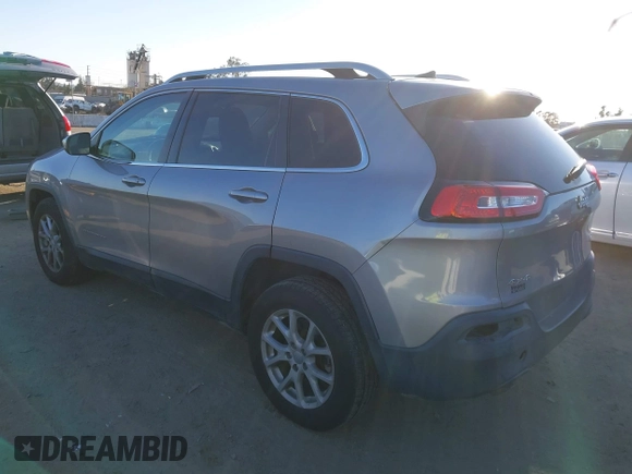 2016 Jeep Cherokee Latitude with VIN 1C4PJMCBXGW118161, listed as a IAAI auction lot 41686583 with 183,431 mi miles. Bid and sale history available at carsss.com. Image 3.