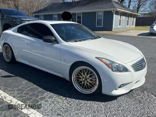 2014 Infiniti Q60 Journey with VIN JN1CV6EKXEM110777, listed as a Copart auction lot 45679495 with 128,241 mi miles and Clean title. Bid and sale history available at DreamBid. Image 1.