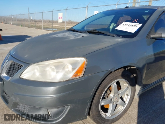 2009 Pontiac G6 1SB z VIN 1G2ZJ57K494248304, wystawiony jako IAAI lot #41649899 z przebiegiem 144 015 mil mil oraz . Historia ofert i sprzedaży dostępna na DreamBid. Obrazek 6.