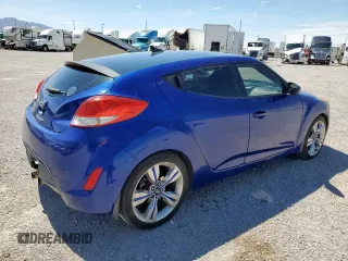 2013 Hyundai Veloster w/Red Int with VIN KMHTC6AD2DU150842, listed as a Copart auction lot 66378455 with 119,901 mi miles and Clean title. Bid and sale history available at DreamBid. Image 3.