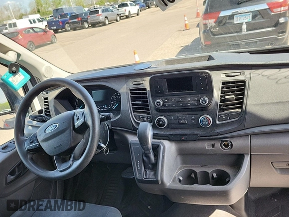 2020 Ford Transit Cargo with VIN 1FTBR2CG4LKA13751, listed as a IAAI auction lot 42667358 with 139,998 mi miles and . Bid and sale history available at DreamBid. Image 1.