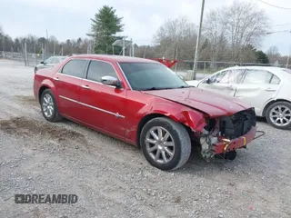 2006 Chrysler 300 C with VIN 2C3LA63H26H421354, listed as a IAAI auction lot 41706454 with 113,647 mi miles. Bid and sale history available at carsss.com. Image 1.