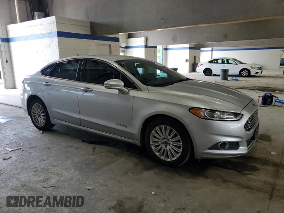 2013 Ford Fusion SE Hybrid with VIN 3FA6P0LU1DR368722, listed as a Copart auction lot 54738695 with 201,326 mi miles and Clean title. Bid and sale history available at DreamBid. Image 4.