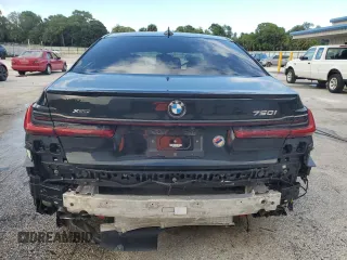 2022 BMW 7 Series 750i xDrive with VIN WBA7U2C01NCK83702, listed as a Copart auction lot 74327704 with Not provided miles and Salvage title. Bid and sale history available at DreamBid. Image 6.