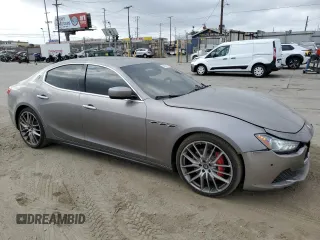 2016 Maserati Ghibli S Q4 z VIN ZAM57RTA6G1172334, wystawiony jako Copart lot #56601575 z przebiegiem 109 524 mil mil oraz Szkody całkowita. Historia ofert i sprzedaży dostępna na DreamBid. Obrazek 4.