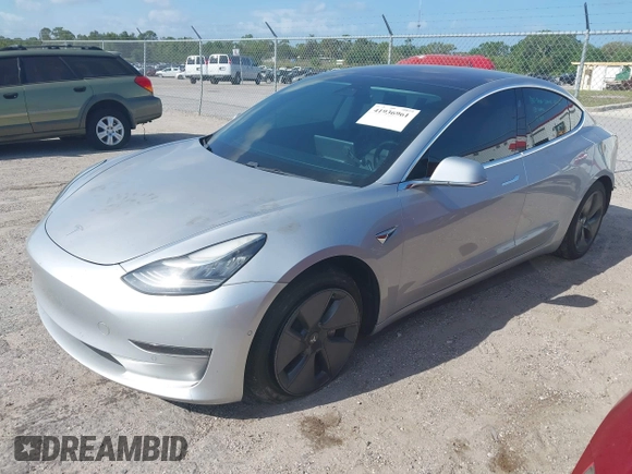 2018 Tesla Model 3 Long Range Battery with VIN 5YJ3E1EB7JF104356, listed as a IAAI auction lot 41936961 with 90,932 mi miles and . Bid and sale history available at DreamBid. Image 18.