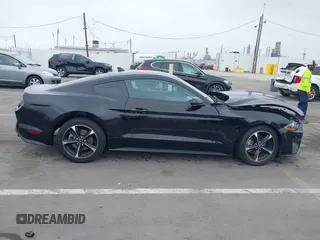 2021 Ford Mustang EcoBoost z VIN 1FA6P8TH7M5115490, wystawiony jako IAAI lot #42428724 z przebiegiem 47 417 mil mil oraz . Historia ofert i sprzedaży dostępna na DreamBid. Obrazek 13.