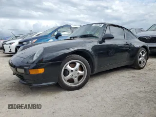 1996 Porsche 911 with VIN WP0AA2999TS321851, listed as a Copart auction lot 74350164 with 103,612 mi miles and Salvage title. Bid and sale history available at DreamBid. Image 1.