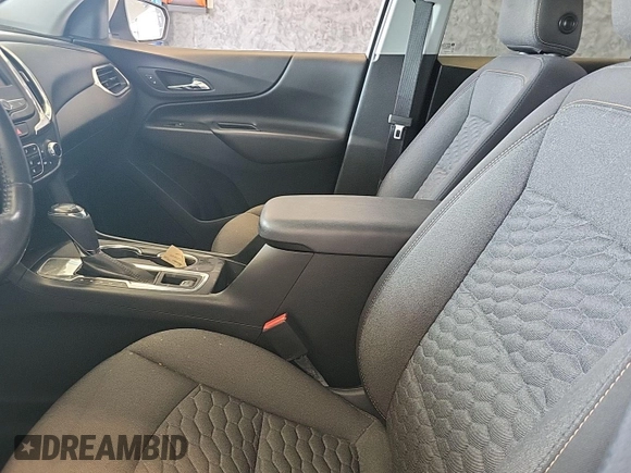 2020 Chevrolet Equinox LT with VIN 2GNAXJEV0L6236404, listed as a IAAI auction lot 42619695 with 77,124 mi miles and . Bid and sale history available at DreamBid. Image 5.
