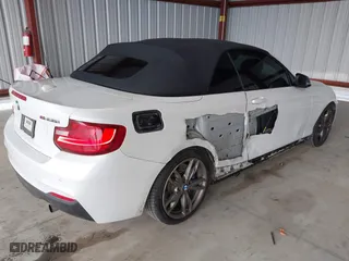 2015 BMW 2 Series M235i with VIN WBA1M1C53FV393300, listed as a IAAI auction lot 41926019 with 180,949 mi miles. Bid and sale history available at carsss.com. Image 4.