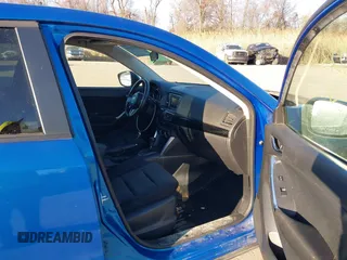 2013 Mazda CX-5 Touring z VIN JM3KE4CE7D0119119, wystawiony jako IAAI lot #41802331 z przebiegiem 204 417 mil mil oraz . Historia ofert i sprzedaży dostępna na DreamBid. Obrazek 5.