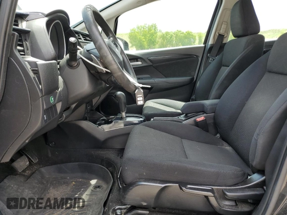 2015 Honda Fit EX-L z VIN 3HGGK5H80FM704920, wystawiony jako Copart lot #59834245 z przebiegiem 86 415 mil mil oraz Szkoda całkowita • Salvage title. Historia ofert i sprzedaży dostępna na DreamBid. Obrazek 7.