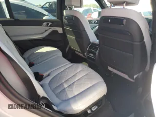 2023 BMW X7 M60i z VIN 5UX33EM07P9P54139, wystawiony jako Copart lot #74120224 z przebiegiem Nie podano mil oraz Szkoda całkowita • Salvage title. Historia ofert i sprzedaży dostępna na DreamBid. Obrazek 11.