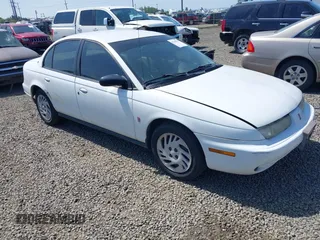 1998 Saturn SL z VIN 1G8ZK5273WZ251392, wystawiony jako IAAI lot #42149274 z przebiegiem 80 544 mil mil oraz . Historia ofert i sprzedaży dostępna na DreamBid. Obrazek 1.