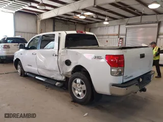 2008 Toyota Tundra LTD with VIN 5TBEV58198S476301, listed as a IAAI auction lot 41528085 with 230,233 mi miles. Bid and sale history available at carsss.com. Image 3.