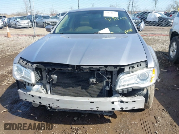 2014 Chrysler 300 z VIN 2C3CCAAG8EH239857, wystawiony jako IAAI lot #41812215 z przebiegiem 183 017 mil mil oraz . Historia ofert i sprzedaży dostępna na DreamBid. Obrazek 13.