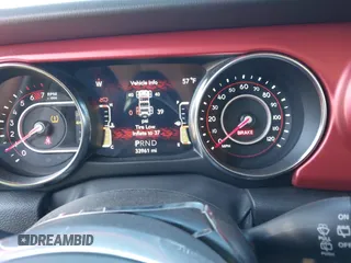 2022 Jeep Wrangler Unlimited Rubicon with VIN 1C4HJXFNXNW149063, listed as a IAAI auction lot 42130171 with 33,961 mi miles and . Bid and sale history available at DreamBid. Image 7.