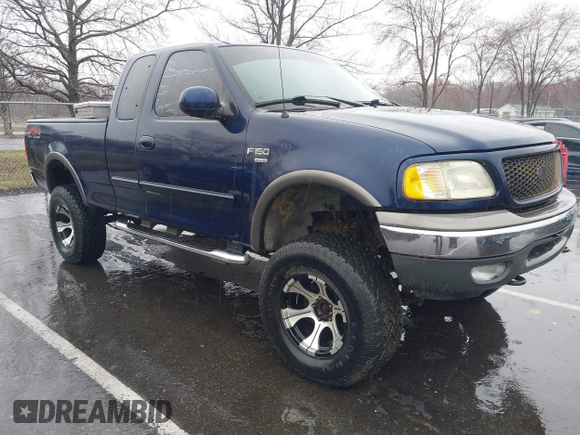 2003 Ford F-150 XL with VIN 1FTRX18L73NA26027, listed as a IAAI auction lot 41843867 with 1 mi miles. Bid and sale history available at carsss.com. Image 1.
