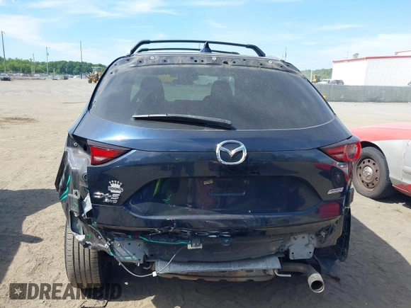 2017 Mazda CX-5 Touring z VIN JM3KFBCL5H0133493, wystawiony jako IAAI lot #39666644 z przebiegiem 125 048 mil mil oraz . Historia ofert i sprzedaży dostępna na DreamBid. Obrazek 6.