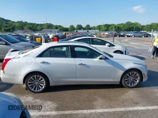 2015 Cadillac CTS Luxury AWD z VIN 1G6AX5SX9F0107244, wystawiony jako IAAI lot #42386444 z przebiegiem 171 413 mil mil oraz . Historia ofert i sprzedaży dostępna na DreamBid. Obrazek 13.