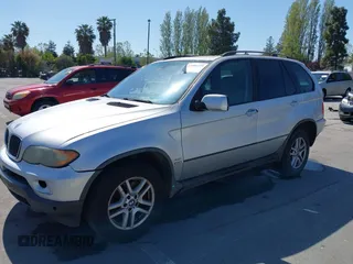 2005 BMW X5 3.0i with VIN 5UXFA13575LY00111, listed as a IAAI auction lot 42084755 with 167,167 mi miles. Bid and sale history available at carsss.com. Image 2.