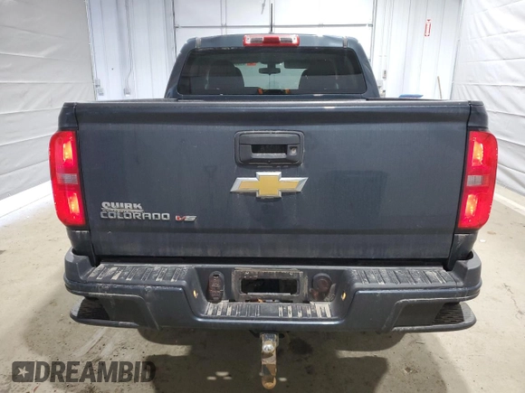 2019 Chevrolet Colorado 4WD Work Truck z VIN 1GCGTBEN2K1240251, wystawiony jako Copart lot #48980085 z przebiegiem 141 759 mil mil oraz Szkoda całkowita • Salvage title. Historia ofert i sprzedaży dostępna na DreamBid. Obrazek 6.