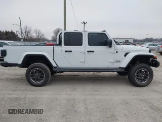 2023 Jeep Gladiator Overland с VIN 1C6HJTFG6PL516742, выставлен на аукционе IAAI как лот 41565864 с пробегом Не указан миль и . История ставок и продаж доступна на DreamBid. Изображение 14.