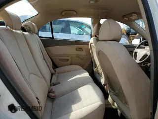 2009 Kia Rio LX with VIN KNADE223X96439445, listed as a Copart auction lot 54619335 with 102,120 mi miles and Salvage Title. Bid and sale history available at DreamBid. Image 10.
