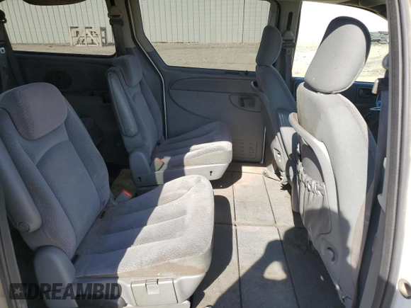 2006 Dodge Grand Caravan SXT z VIN 2D4GP44L96R630705, wystawiony jako Copart lot #55657705 z przebiegiem 243 020 mil mil oraz Szkoda całkowita • Salvage title. Historia ofert i sprzedaży dostępna na DreamBid. Obrazek 11.