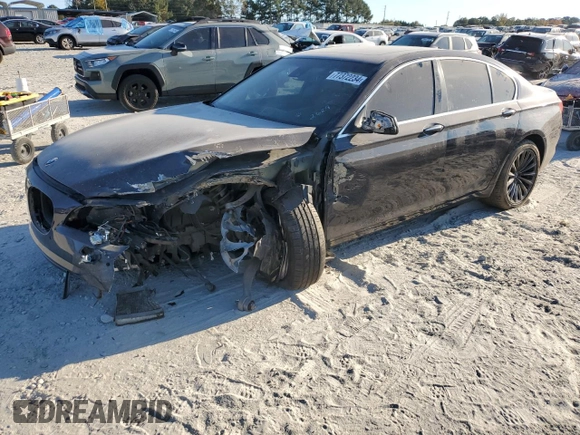 2011 BMW 7 Series 740i with VIN WBAKA4C51BC612629, listed as a Copart auction lot 77372234 with 164,471 mi miles and Salvage Title. Bid and sale history available at carsss.com. Image 1.