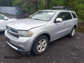 2013 Dodge Durango Crew with VIN 1C4SDJDT8DC565608, listed as a IAAI auction lot 42181773 with 161,485 mi miles and . Bid and sale history available at DreamBid. Image 2.