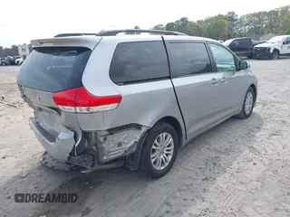 2012 Toyota Sienna XLE AAS with VIN 5TDYK3DC4CS251821, listed as a IAAI auction lot 41932724 with 149,395 mi miles. Bid and sale history available at carsss.com. Image 4.