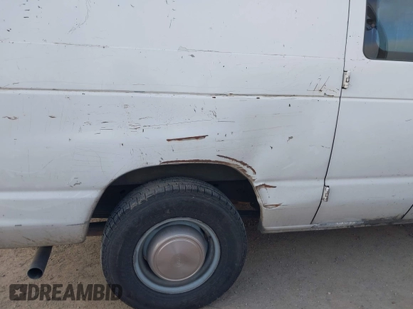 1999 Ford Econoline Cargo Commercial with VIN 1FTNE24L3XHB84868, listed as a IAAI auction lot 41151145 with 450,651 mi miles and . Bid and sale history available at carsss.com. Image 13.