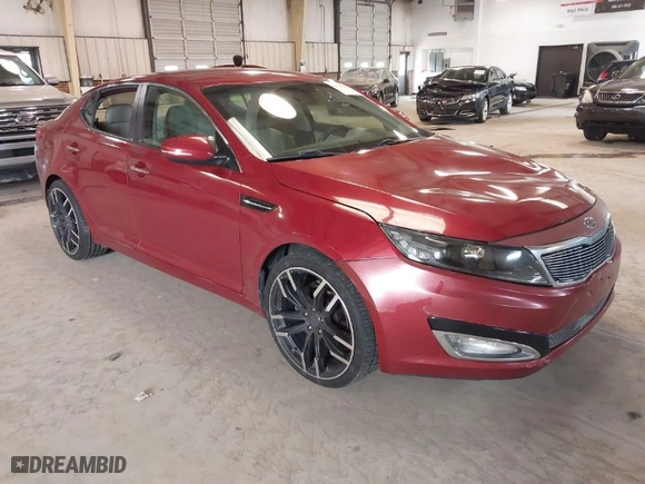 2012 Kia Optima LX with VIN 5XXGM4A75CG020124, listed as a IAAI auction lot 41748367 with 214,760 mi miles. Bid and sale history available at carsss.com. Image 1.