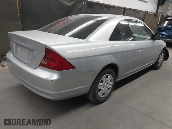 2003 Honda Civic LX with VIN 1HGEM22573L012729, listed as a IAAI auction lot 42041772 with 157,207 mi miles. Bid and sale history available at carsss.com. Image 4.