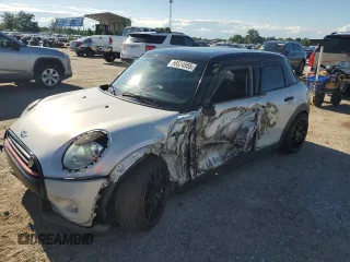 2016 MINI Hardtop 4 Door with VIN WMWXU1C59G2A93437, listed as a Copart auction lot 56624955 with 102,957 mi miles and Salvage title. Bid and sale history available at DreamBid. Image 1.