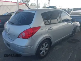 2009 Nissan Versa 1.8 SL with VIN 3N1BC13E29L406619, listed as a IAAI auction lot 41761728 with 115,510 mi miles. Bid and sale history available at carsss.com. Image 4.