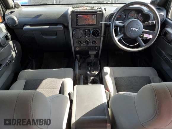 2009 Jeep Wrangler Unlimited X with VIN 1J4GZ39139L742349, listed as a Copart auction lot 46610165 with 57,652 mi miles and Salvage Title. Bid and sale history available at carsss.com. Image 8.