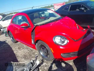 2013 Volkswagen Beetle Fender Edition with VIN 3VWJP7AT5DM619632, listed as a IAAI auction lot 40550698 with 35,000 mi miles and . Bid and sale history available at DreamBid. Image 1.