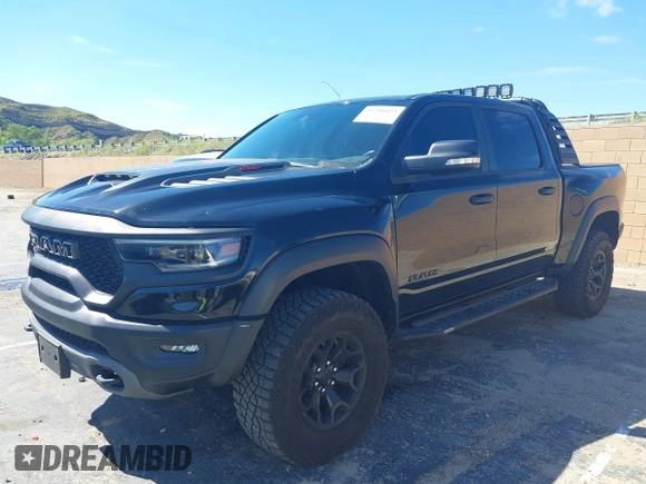 2022 Ram 1500 TRX with VIN 1C6SRFU95NN346475, listed as a IAAI auction lot 39200422 with 14,919 mi miles and . Bid and sale history available at DreamBid. Image 17.