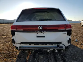 2024 Volkswagen Atlas Peak Edition SE with VIN 1V2CR2CA5RC586126, listed as a Copart auction lot 80706084 with 5,106 mi miles and Salvage title. Bid and sale history available at DreamBid. Image 6.