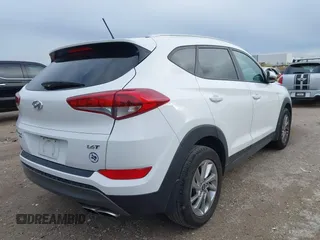 2016 Hyundai Tucson Sport with VIN KM8J33A2XGU242256, listed as a IAAI auction lot 41065573 with 97,503 mi miles. Bid and sale history available at carsss.com. Image 4.