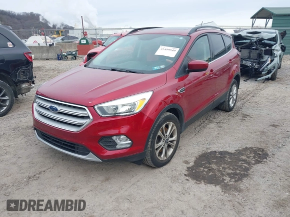 2018 Ford Escape SE z VIN 1FMCU9GD6JUA18684, wystawiony jako IAAI lot #41499540 z przebiegiem 105 127 mil mil oraz . Historia ofert i sprzedaży dostępna na DreamBid. Obrazek 17.