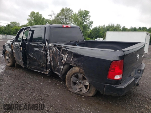 2016 Ram 1500 Tradesman with VIN 1C6RR7STXGS229806, listed as a Copart auction lot 61156965 with 102,296 mi miles and Salvage title. Bid and sale history available at DreamBid. Image 2.
