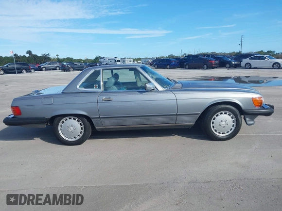 1988 Mercedes-Benz 560 SL with VIN WDBBA48D0JA088479, listed as a IAAI auction lot 41272731 with 91,858 mi miles and . Bid and sale history available at DreamBid. Image 13.